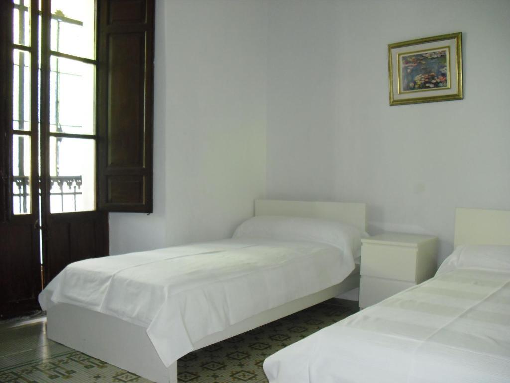 Seneca Hostel Córdova Quarto foto